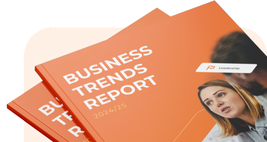 Cover of Business Trends Report 2024/25 from OneAdvanced. The cover is orange, with title in white, as well as featuring some key stats and two people in conversation.